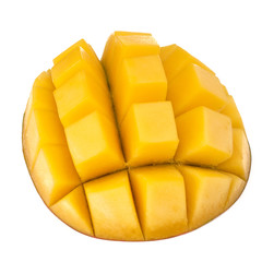Sliced mango cubes isolated on white background