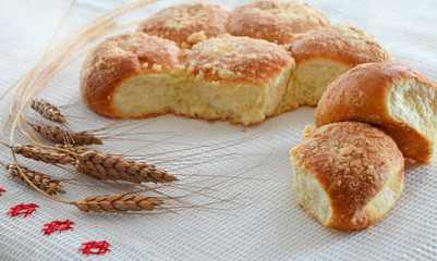 Bread on waffle towel embroidered with Russian, the concept of rural lunch, healthy food, agriculture, baking