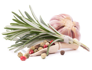 rosemary herb spice leaves, garlic and peppercorns isolated on w