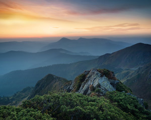 Mountains during sunset. Beautiful natural landscape in the summer time..