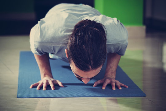 Young Man Doing Yoga  Indoor