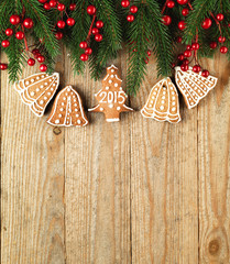 Christmas fir tree with decoration on a wooden board