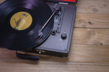 Record player stylus on old wooden