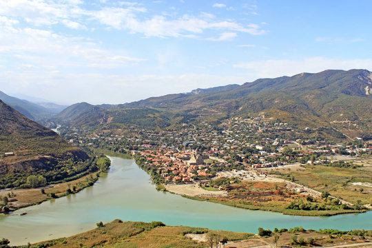 View of Mtskheta and river junction on mountains, Mtskheta, Georgia