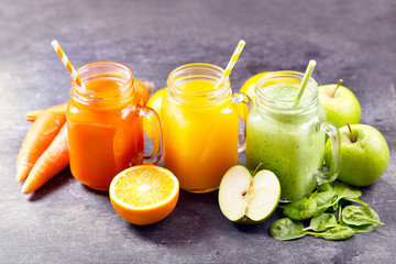 Fototapeta na wymiar Fresh juice and smoothies with fruits and vegetables