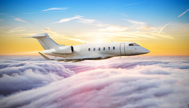 Fototapeta Private jet plane flying above clouds