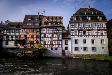 Obraz premium Historic old town half-timber houses on river Ill in Petite France district in Strassburg, Alsace, France
