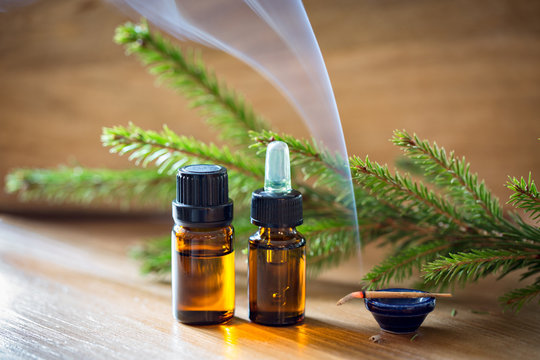 Spruce needle aromatherapy essential oils in bottles