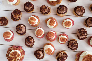 Cake shu eclairs on a white background.