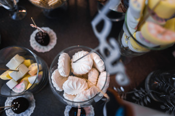 Candy bar on wedding ceremony with a lot of different candies an