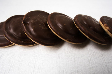 Top view of several chocolate covered snack cakes