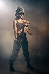 The girl - a soldier with a bear 