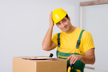 Man delivering boxes during house move