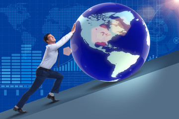 Businessman pushing earth in business concept