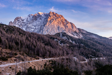 Mountain and road at sunset