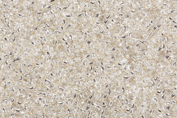 Seashell seed beads background.
