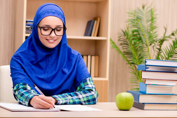 Muslim girl preparing for entry exams