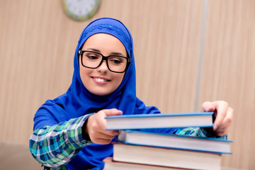 Muslim girl preparing for entry exams