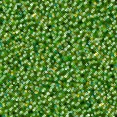 Emerald green shiny defocused lights. Seamless texture. Tile rea