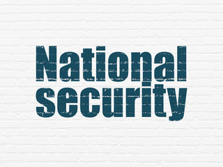 Protection concept: National Security on wall background