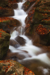 Stream od water in a beautiful cascade