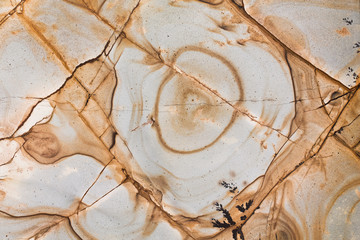 Abstract brown granite stone wall.