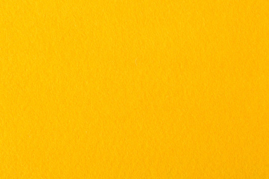 Close up of bright yellow felt fabric.