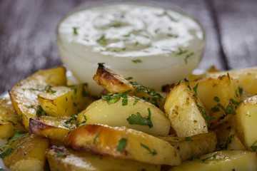 Golden backed potatoes with garlic sauce