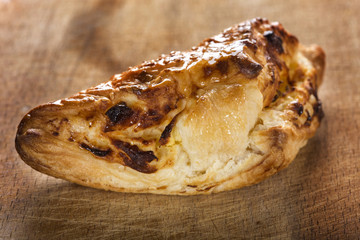 Cheese patty smeared with honey and sesame seeds