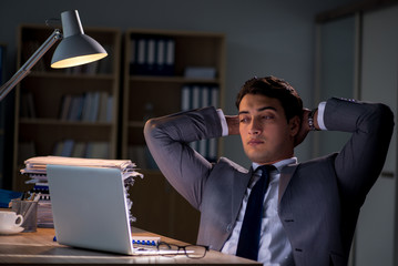 Man staying in the office for long hours