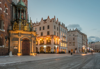 Fototapeta Krakow, Poland, St Mary's church and houses on Main Market square in the morning obraz