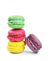 Different types of tasty and colorful macaroons isolated on the white background with copy space