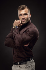 Muscular rich business man portrait