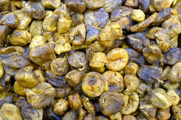 Closeup dried figs background