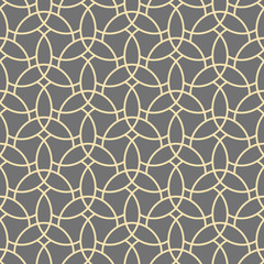 Seamless vector ornament. Modern background. Geometric pattern with repeating golden wavy lines