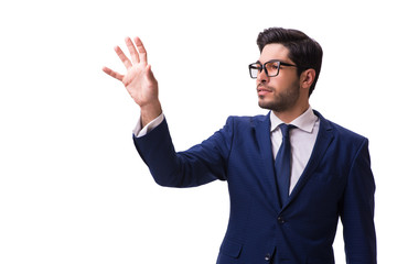 Young businessman pressing virtual buttons isolated on white