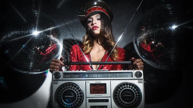 latina woman posing in amazing red catsuit vintage ghettoblaster