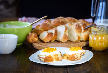 Challah bread on wooden table