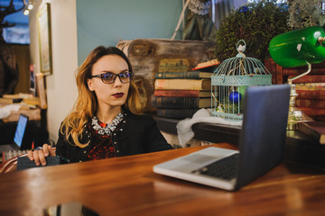 business woman in old library