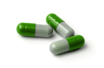 Three Pills Isolated on a White Background