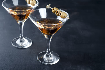 Martini glass and olives