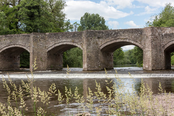 Ancient Stone Road Bridge over River, UK