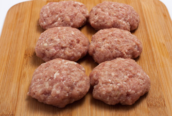 raw meatballs on board