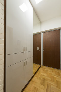 Apartment entrance interior. Modern closet in corridor