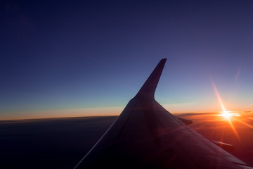 sunset view from the window of an airplane - 132640410