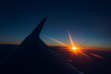 sunset view from the window of an airplane