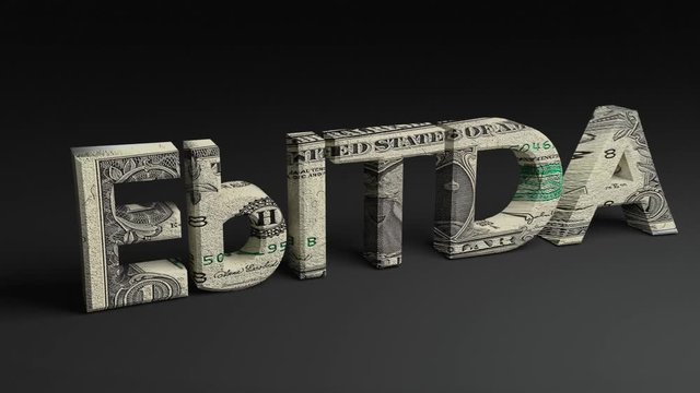 focused Lens animation on EbITDA word with dollar note texture