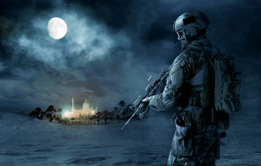 Green Berets US Army Special Forces soldier patrolling desert. Cloudy night, full moon, oasis palace