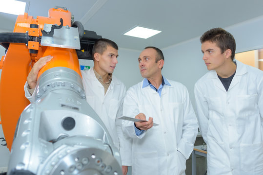 giving instructions to young apprentice