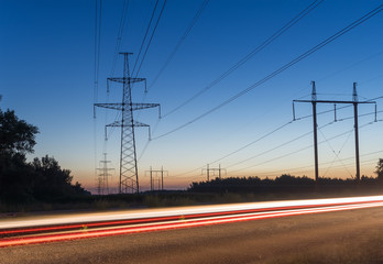 Power Line. pylon against a blue sky.